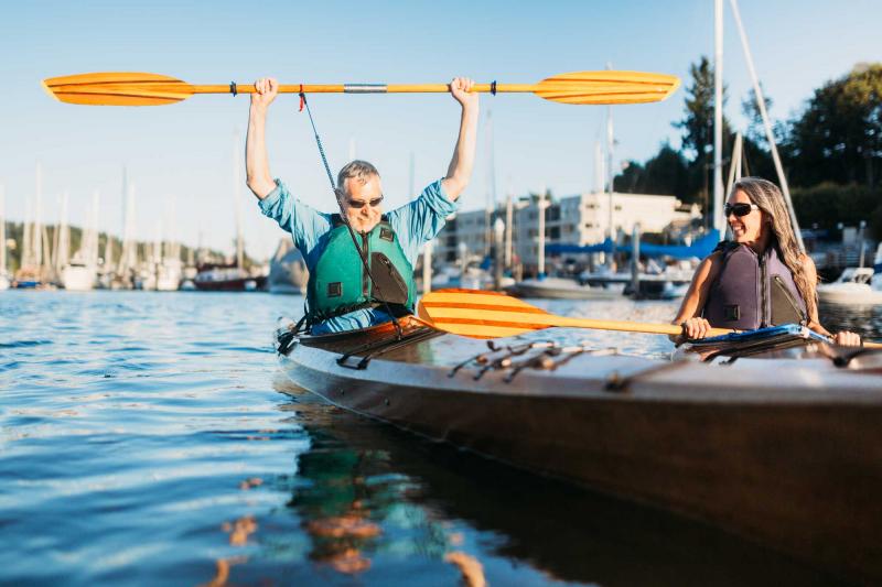 Man and woman kayaking in Gig Harbor, WA