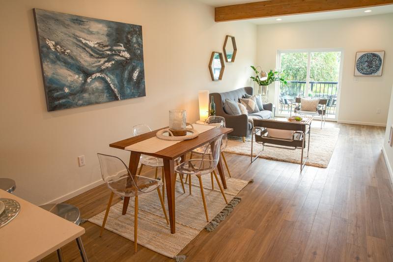 Breakfast nook and living room in open-concept floorplan